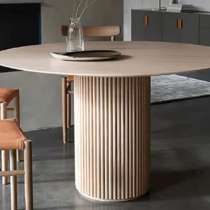 Table à manger ronde en travertin pied central strié | Serina